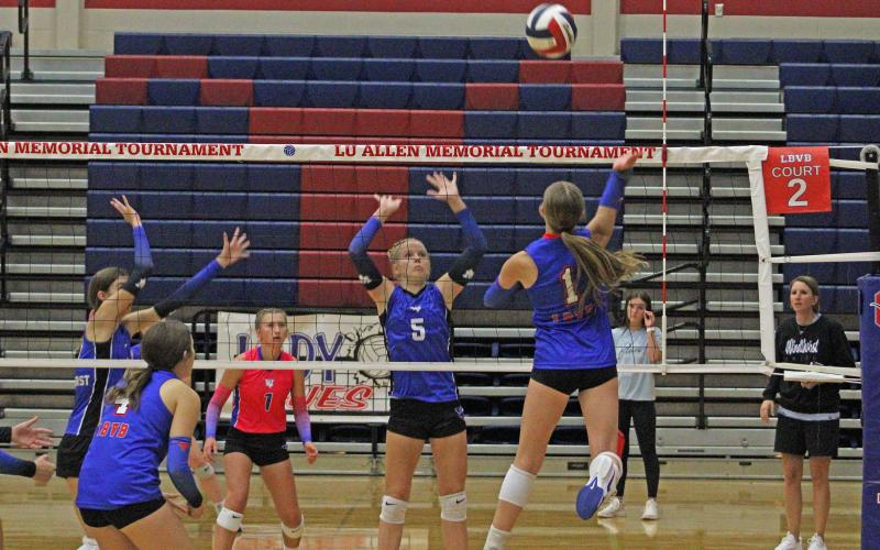 (ALEX HAVARDANSKY | THE GRAHAM LEADER) Katy McGehee goes up for a kill Saturday, Aug. 23, at the Lu Allen Memorial Volleyball Tournament. A total of 32 teams participated in the tournament.