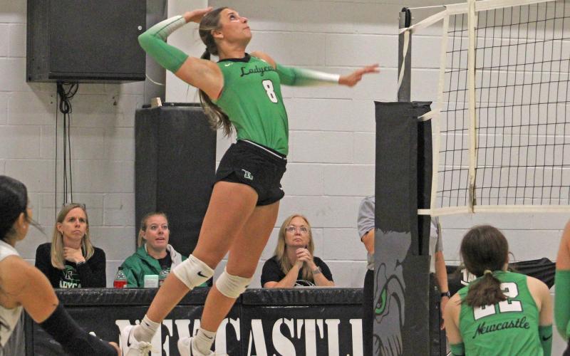 (ALEX HAVARDANSKY | THE GRAHAM LEADER) Kenzie King goes up for a kill Tuesday, Sept. 16, against the Gold-Burg Lady Bears. King is one of three juniors on the Ladycats this season. 