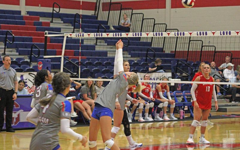 (ALEX HAVARDANSKY | THE GRAHAM LEADER) Kya Cooper returns a ball behind his back Tuesday, Aug. 19. Cooper was pivotal in the passing game against the Lady Indians with 14 assists. 