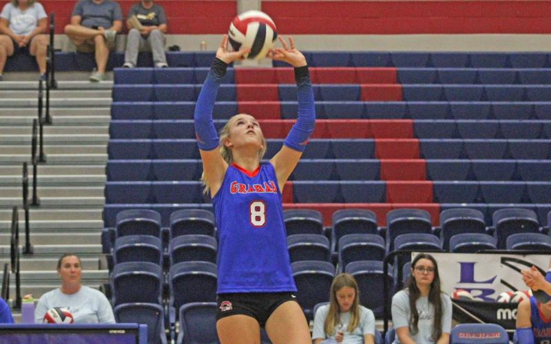 (ALEX HAVARDANKSY | THE GRAHAM LEADER) Kya Cooper sets a ball Friday, Sept. 12. Cooper has proven to be the team’s primary setter but also has sneaky power in the front row.