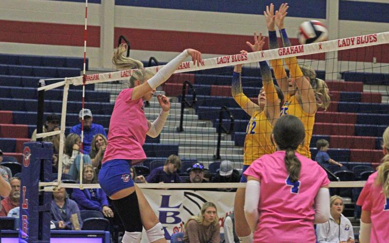 (ALEX HAVARDANKSY | THE GRAHAM LEADER) Kya Cooper swats at the ball for a kill attempt Tuesday, Oct. 21 against the Brock Lady Eagles. The Lady Blues lost to Brock in three sets. 