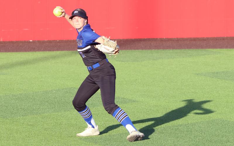 (THOMAS WALLNER | THE GRAHAM LEADER) Jansyn Louder throws the ball in from left field during the Lady Blues' 11-1 loss Tuesday, March 24, on Hogan Field.