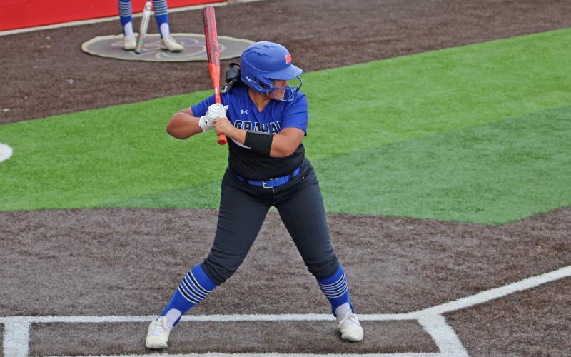 (ALEX HAVARDANSKY | THE GRAHAM LEADER) Kimberly Aguirre prepares to swing in the Lady Blues hometown tournament. Aguirre plays second base for the Lady Blues. 