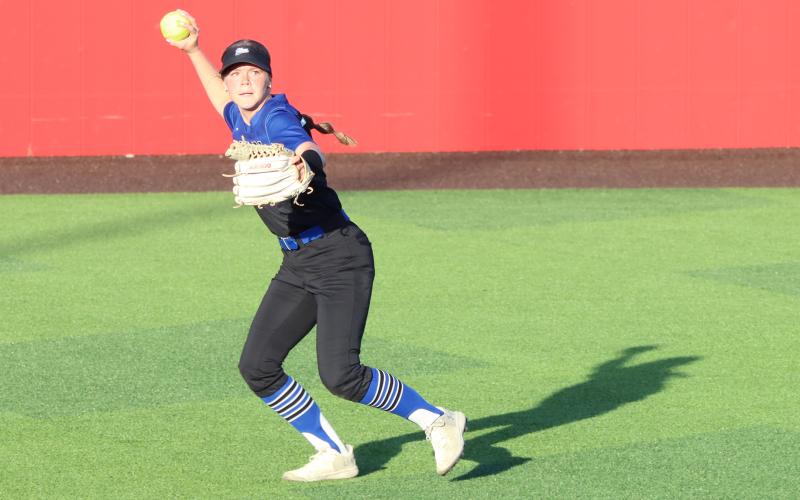 (THOMAS WALLNER | THE GRAHAM LEADER) Jansyn Louder throws the ball in from left field during the Tuesday, March 24 matchup against the Brock Lady Eagles at Hogan Field. The Lady Blues fell to the Mineral Wells Lady Rams during their matchup Tuesday, March 31.