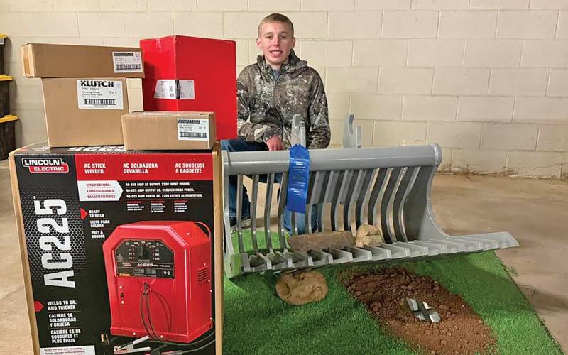 (OLNEY FFA | CONTRIBUTED PHOTO) Caden Lane, of Olney FFA, won second place in the Jr. Ag Mechanics competition for Tractor Mounted and/or Pulled Equipment at the Fort Worth Stock Show & Rodeo.