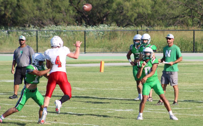 (ALEX HAVARDANSKY | THE GRAHAM LEADER) London Martinez throws off his back foot Friday, Aug. 22, against Baird. Martinez is entering his senior season for the Bobcats.