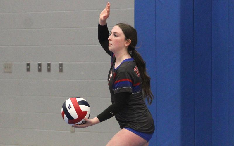 (ALEX HAVARDANKSY | THE GRAHAM LEADER) Makenzie Vacante gets ready to throw the ball up for a serve attempt Thursday, Oct. 2 against the Brock Lady Eagles. Vacante was a solid presence at the service line for the Lady Blues in this match, earning points from that spot.