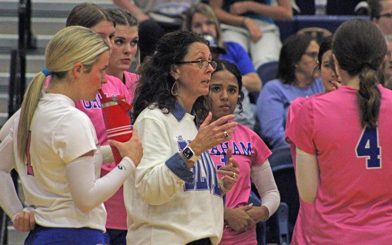 (ALEX HAVARDANKSY | THE GRAHAM LEADER) Coach Marci Faulk speaks to the Lady Blues prior to their match Tuesday, Oct. 21 against the Brock Lady Eagles. Faulk said the number one thing the team needed to improve going forward was building consistency.