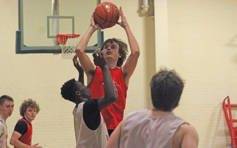 (ALEX HAVARDANKSY | THE GRAHAM LEADER) Nick Wankowicz goes up over a defender for a layup Tuesday, Sept. 30, against Wichita Falls Christian. Wankowicz continues to be critical for the team’s rebounding and ability to create second chance opportunities.