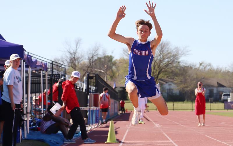 (THOMAS WALLNER | THE GRAHAM LEADER) Nolan Wankowicz competes in the Triple Jump Big School 3A, 4A competition during the 78th annual PK Relays that were held Saturday, March 21 at Newton Field.