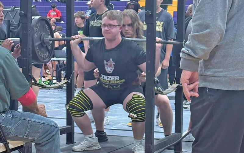 (GRAHAM ATHLETICS | CONTRIBUTED PHOTO) Scout Smith competes in Boys Region 1 Division 2 powerlifting meet held Thursday, March 6 at Abilene Wylie. Smith placed third in the 242 weight class.