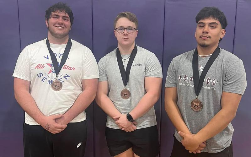 (GRAHAM ATHLETICS | CONTRIBUTED PHOTO) McCrae Reese, Scout Smith and Mateo Rodriguez pose with their medals after competing in the Boys Region 1 Division 2 powerlifting meet held Thursday, March 6 at Abilene Wylie. 
