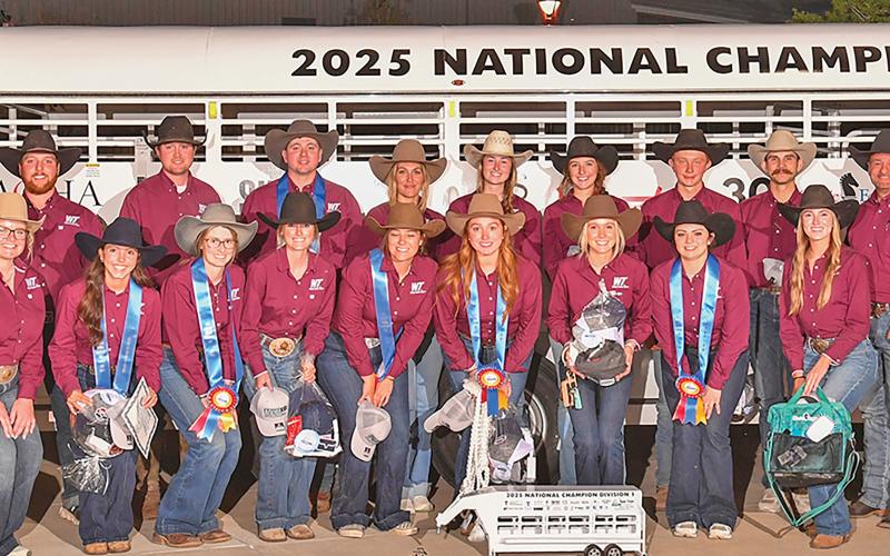 (WEST TEXAS A&M UNIVERSITY | CONTRIBUTED PHOTO) The West Texas A&M University Ranch Horse team poses in front of the award trailer that the team will use as the national champion winners in the National Intercollegiate Ranch and Stock Horse Association’s Collegiate National Championship Show. Lele Chisholm of Graham is show third from right in front.