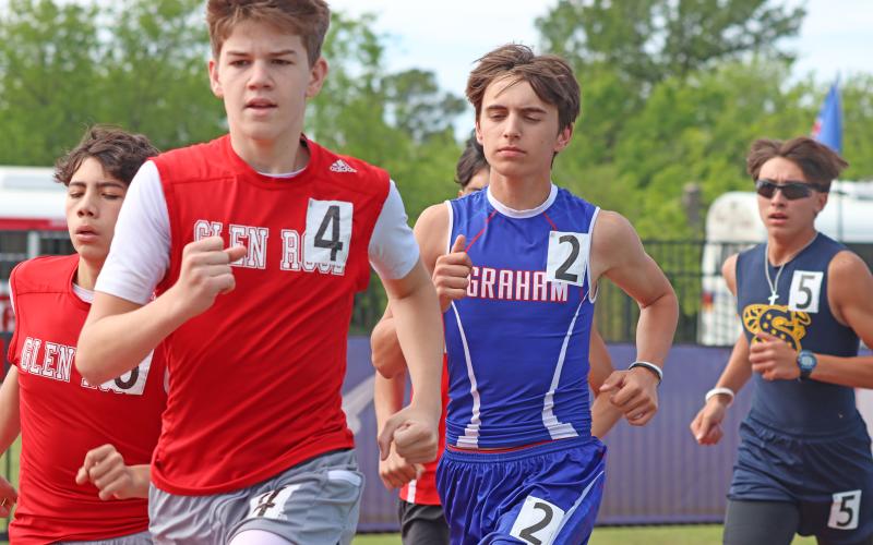 (THOMAS WALLNER | THE GRAHAM LEADER) Dayne Dunnam runs in the 3200-Meter Run at the district track meet Wednesday, April 8 at Newton Field in Graham.