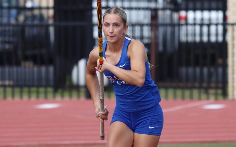 (THOMAS WALLNER | THE GRAHAM LEADER) Ava Street runs to complete a heat of pole vaulting Wednesday, April 8 during the district meet held in Graham.