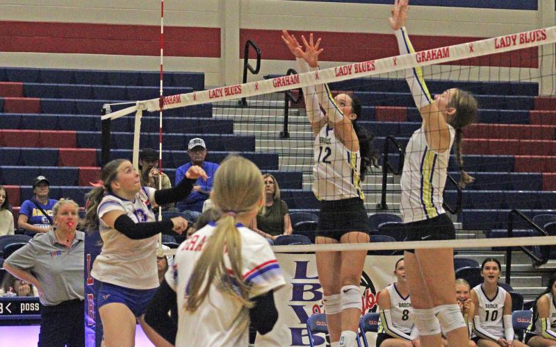 (ALEX HAVARDANKSY | THE GRAHAM LEADER) Ruby Shaffer clears the ball for a point attempt Tuesday, Oct. 21 against the Brock Lady Eagles. The team looks to bounce back against the Mineral Wells Lady Rams after their loss to Brock.