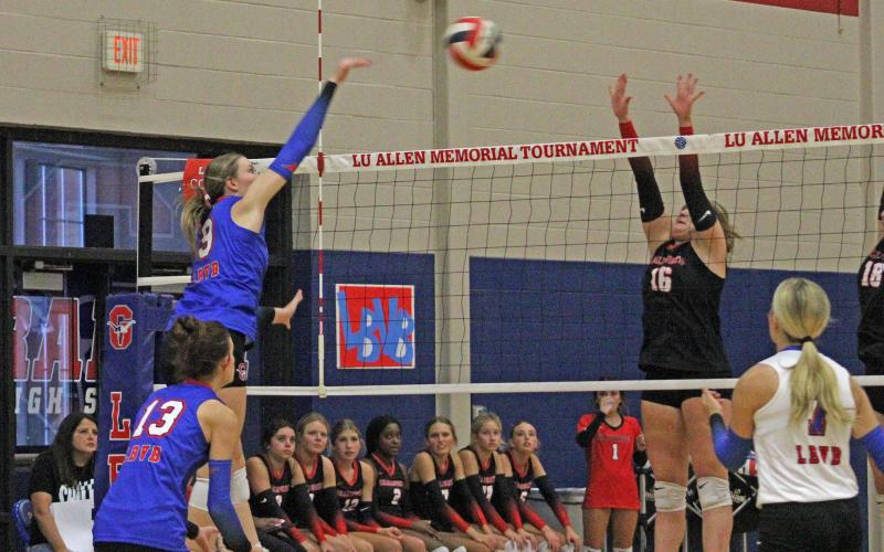 (ALEX HAVARDANSKY | THE GRAHAM LEADER) Rylee Moore goes up for a kill attempt Saturday, Aug. 23, at the Lu Allen Memorial Volleyball Tournament. Moore has been a constant presence in the front row for the Lady Blues this season.