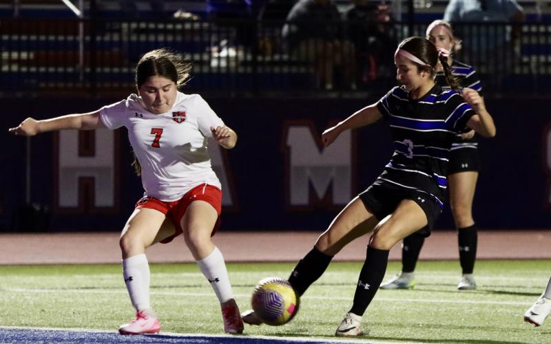 (THOMAS WALLNER | THE GRAHAM LEADER) Haley Escalante shoots the ball Friday, Feb. 13 against the Mineral Wells Lady Rams. Escalante was one of the seniors honored on senior night for the Lady Blues. 
