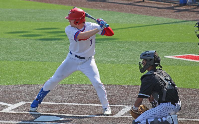 (ALEX HAVARDANSKY | THE GRAHAM LEADER_ Cooper Corley lines up for a swing Friday, March 6. The Steers picked up a victory over the Clyde Bulldogs 5-2 in their hometown tournament. 