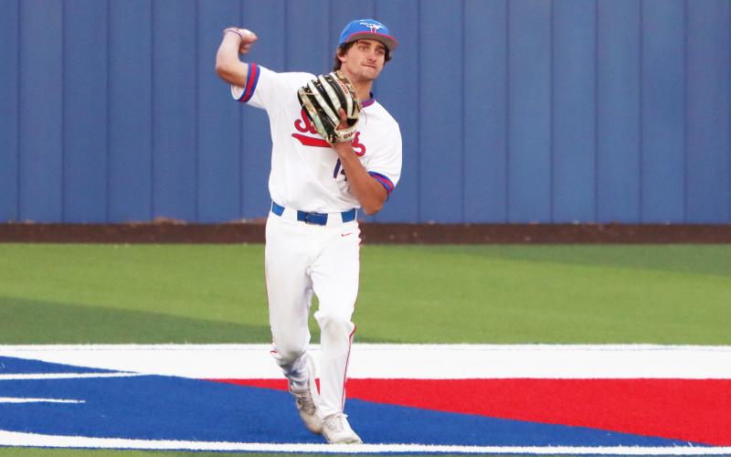 (THOMAS WALLNER | THE GRAHAM LEADER) Cason Roberts winds up a throw during a previous game in the season Tuesday, March 17 against the Jim Ned Indians. The Steers earned their first win of district Thursday, April 2.