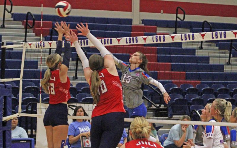 (ALEX HAVARDANSKY | THE GRAHAM LEADER) Tara Dawson tips a ball over the defense Tuesday, Aug. 19, against the Lady Indians. Dawson is one of seven senior leaders on the team. 