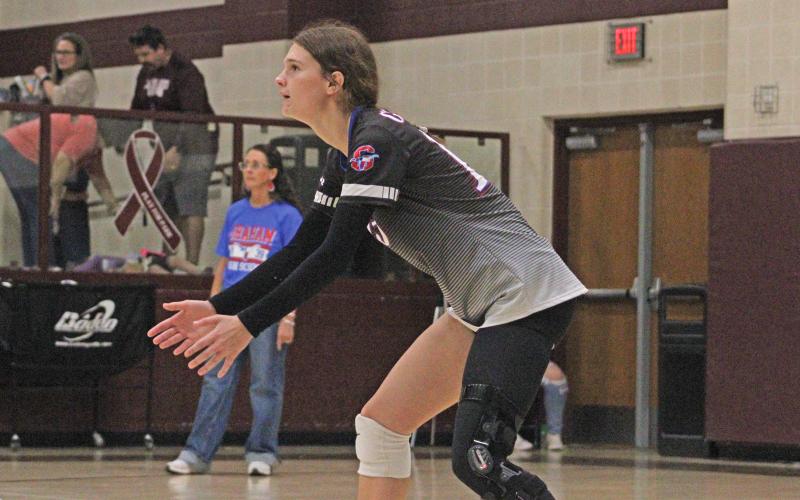 (ALEX HAVARDANSKY | THE GRAHAM LEADER) Tara Dawson lines up in the back row Tuesday, Sept. 9 against the Bowie Lady Rabbits. Dawson has come back from injury this season to be a leader both on and off the court. 