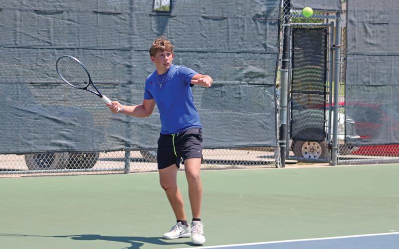 (ALEX HAVARDANSKY | THE GRAHAM LEADER) Tyler Bryan sets up to return a serve Wednesday, Aug. 6. Bryan had the most dominant win on the boys singles team in a Graham loss to Azle 11-8 on the day. 