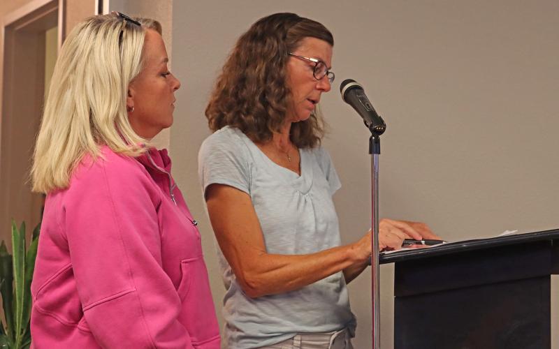 (THOMAS WALLNER | THE GRAHAM LEADER) Humane Society of Young County President Heather Allen (at left) and board member Leslie Singleton speak Tuesday, Oct. 7 with the Graham City Council regarding three changes to a contract for animal services.