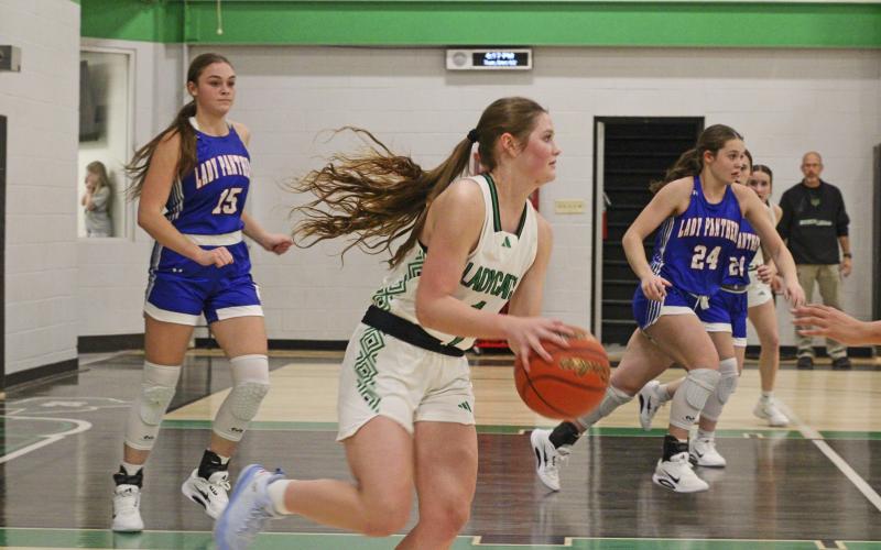 (ALEX HAVARDANSKY | THE GRAHAM LEADER) Camren Mallory dribbles the ball up the floor Tuesday, Dec. 2 against Gorman. Mallory scored six points in the Ladycats’ 48-25 loss to the Lady Panthers.