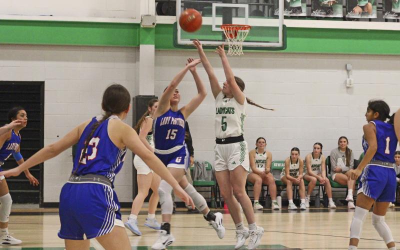 (ALEX HAVARDANSKY | THE GRAHAM LEADER) Kinzlee Sweat shoots a midrange jumpshot Tuesday, Dec. 2 against Gorman. Sweat scored six points on midrange jumpers in the Ladycats’ 48-25 loss to the Lady Panthers.