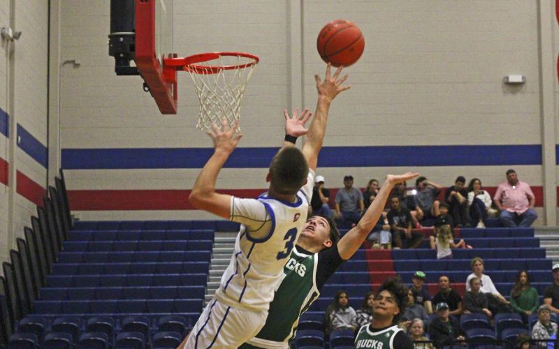 (ALEX HAVARDANKSY | THE GRAHAM LEADER) Jagger Nees puts up a floater in one of the Steers’ previous Matchups. Nees scored 11 points in Graham’s 78-22 win Tuesday, Dec. 2 against the Colorado City Wolves.