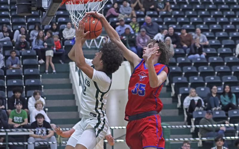 (TC GORDON | THE GRAHAM LEADER) The Steers’ Nikolas Wankowicz blocks a Breckenridge shot attempt near the rim Monday, Nov. 25 late in the game of Graham’s 49-45 loss to the Buckaroos.