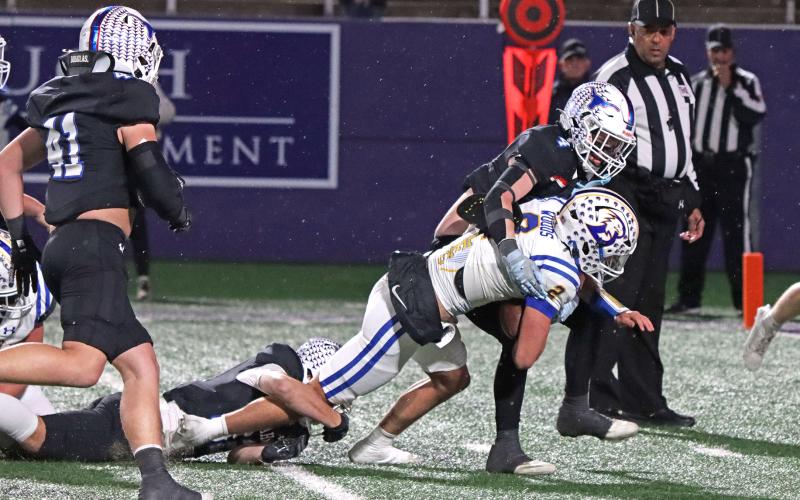 (TC GORDON | THE GRAHAM LEADER) Graham defenders drag down a Brock ball carrier Friday, Dec. 6 early in the game of the Steers’ 12-10 triple overtime loss to the Eagles in the Region 1-4A DII Final.