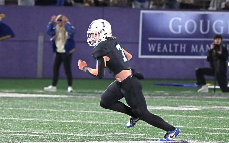 (TC GORDON | THE GRAHAM LEADER) Defensive back Cooper Corley looks for an opening in the field to run after he hauled in Graham’s second interception of the game Friday, Dec. 6 in the region final against Brock. The Steers’ season ended in a 12-10 triple overtime loss to the Eagles.