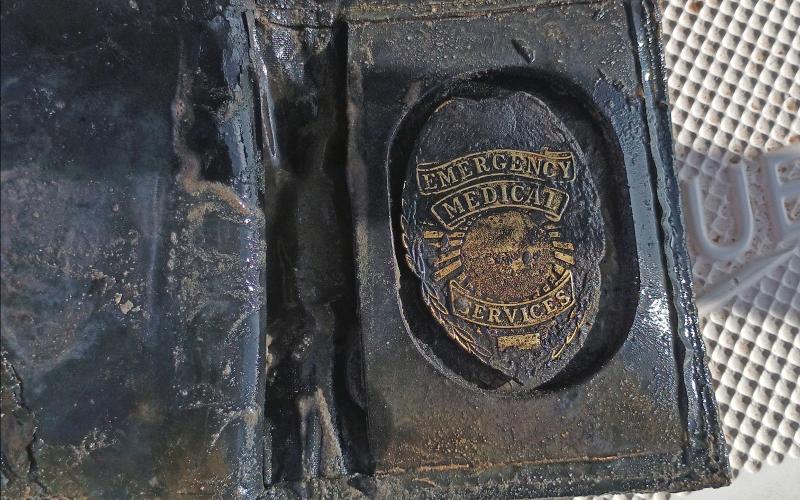 (CHRIS SISK | CONTRIBUTED PHOTO) The back of a wallet caught in March on Possum Kingdom Lake belonging to Martin Oswald. Chris Sisk managed to connect with Oswald's wife and send her a lost memory of her late husband.