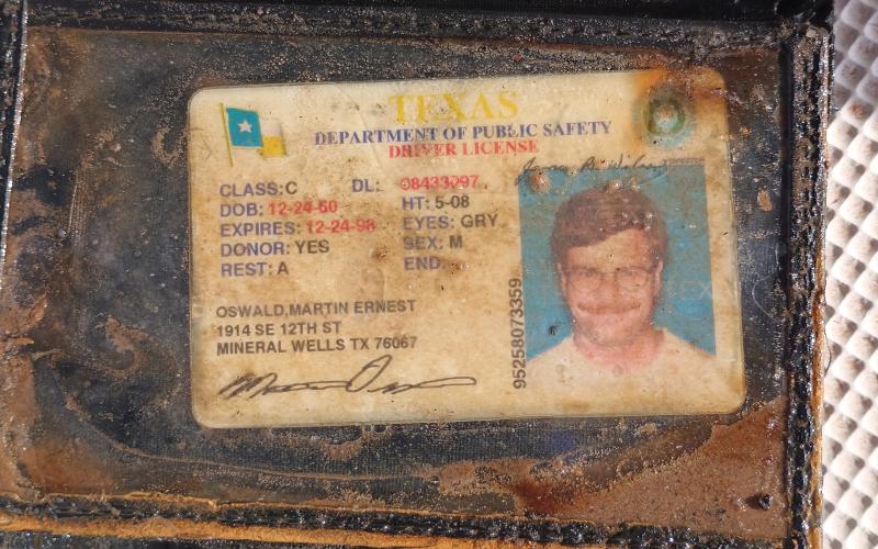 (CHRIS SISK | CONTRIBUTED PHOTO) A wallet that was caught in Possum Kingdom Lake belonging to Martin Oswald. Chris Sisk led a fishing guide service last month where the group caught the wallet. Fisk turned to social media to seek more information.
