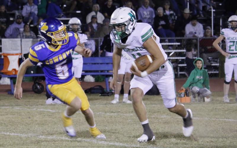 (ASHLEY ANDERSON | JACKSBORO HERALD-GAZETTE) Rylan Hinojosa runs a ball back against Bryson in their matchup Friday, Nov. 7. Hinojosa had a sack as well as a forced fumble and a defensive score. 