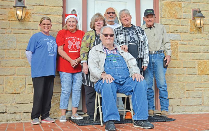 (THOMAS WALLNER | THE GRAHAM LEADER) Volunteers with Charlie’s Angels in Graford pose outside the facility which provides free meals each Tuesday and Thursday. Shown, left to right, are Magyn Whitaker, Katy Wallner, Angelia Hardin, George Rodriquez (back), Charles Self (front), Sandy Dutton and Tommy Nicklas.