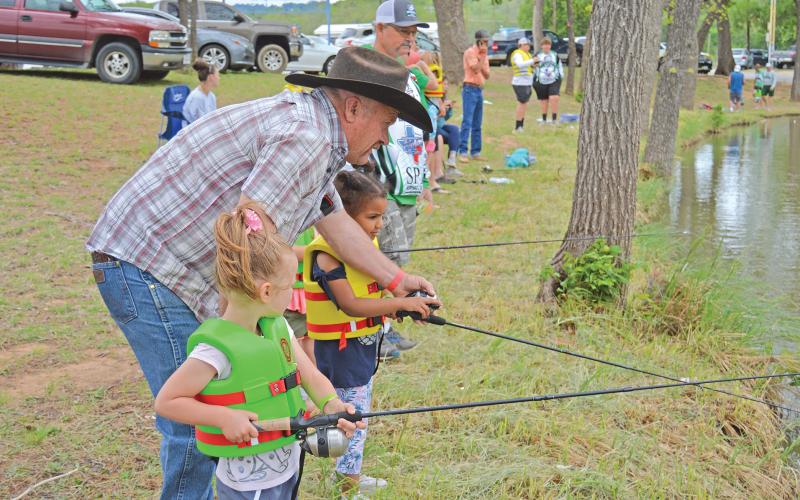 (THOMAS WALLNER | THE GRAHAM LEADER) Children fishing at the Young Anglers event held at Fireman’s Park in April alongside the Remembering Wyatt Dale Water Safety Fun in the Sun event. Fireman’s Park will be receiving a number of improvements from city and grant funding from Texas Parks and Wildlife.