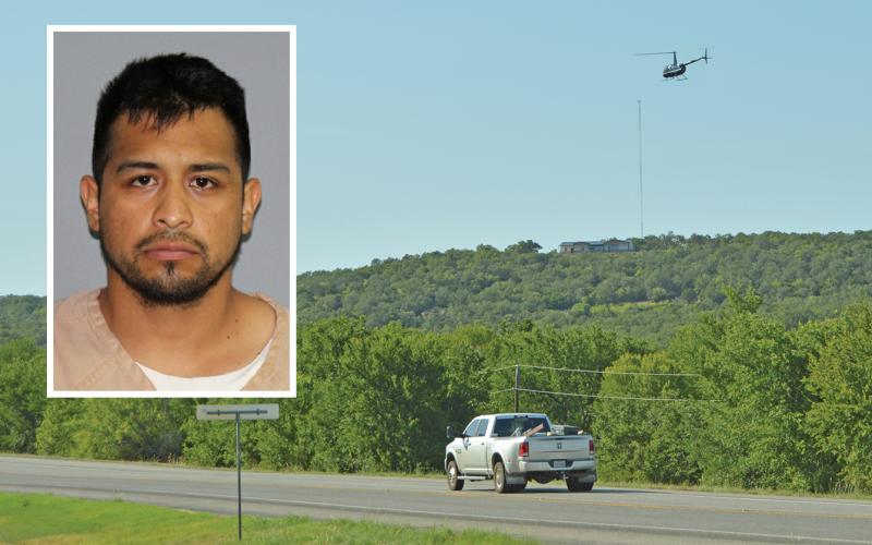 Young County Sheriff Travis Babcock searches in a helicopter during a manhunt along Hwy. 16 S for a Palo Pinto man with multiple charges Wednesday, Aug. 3. Roberto Damian Rodriguez-Garay, 30, was still at large as of Thursday afternoon.