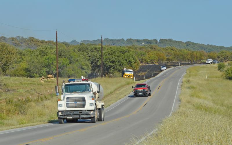 (MADDISON EVANS | THE GRAHAM LEADER) Volunteer Fire Department crew returning from a grass off FM 61 in Young County Wednesday, Sept. 28.