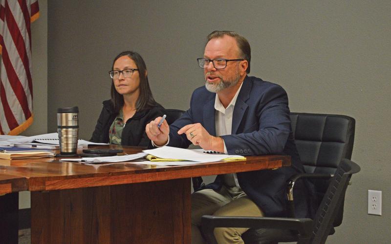 (THOMAS WALLNER | THE GRAHAM LEADER) City Manager Eric Garretty speaks at the Graham City Council meeting Thursday, Dec. 8. He spoke to the council regarding the scope of the proposed main water line replacement project changing from the original plan.