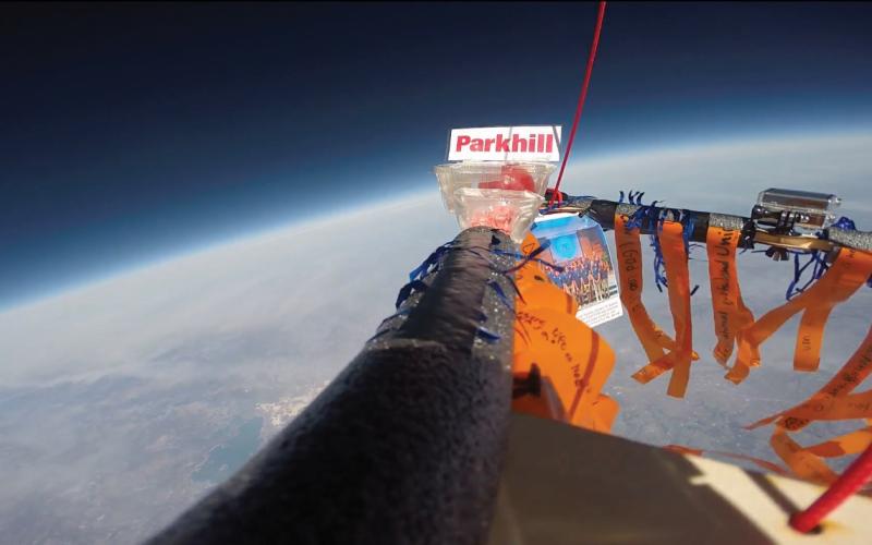 (CONTRIBUTED PHOTO | CLAIRE MESCHKAT) One of two GoPro cameras attached to the base of a payload takes a photo of the curvature of the earth and space before it pops and makes it descent. The base had different experiments and instruments to measure temperature, altitude and more.
