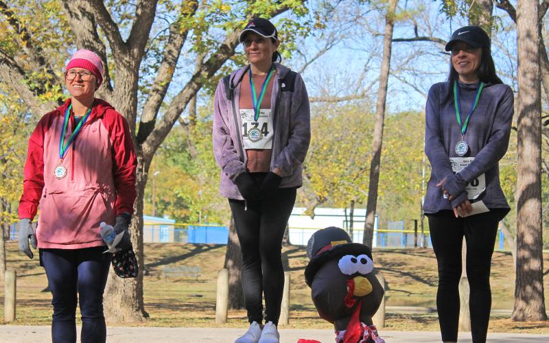 (KYLIE BAILEY | THE GRAHAM LEADER) Overall female winners in the Spivey Hill Challenge 5K race. The top three winners were Adela Arvizu, Bobbie Marrufo and Crystal Stewart.
