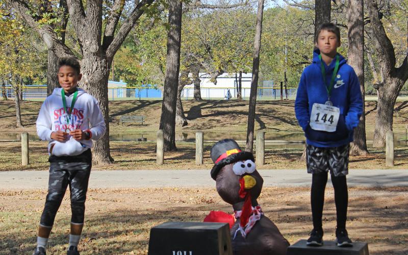 (KYLIE BAILEY | THE GRAHAM LEADER) Male 11 to 14 winners in the Spivey Hill Challenge 5K race. The top three winners were Trace Tillman, Ryan Howell and Jonah Sharpe.