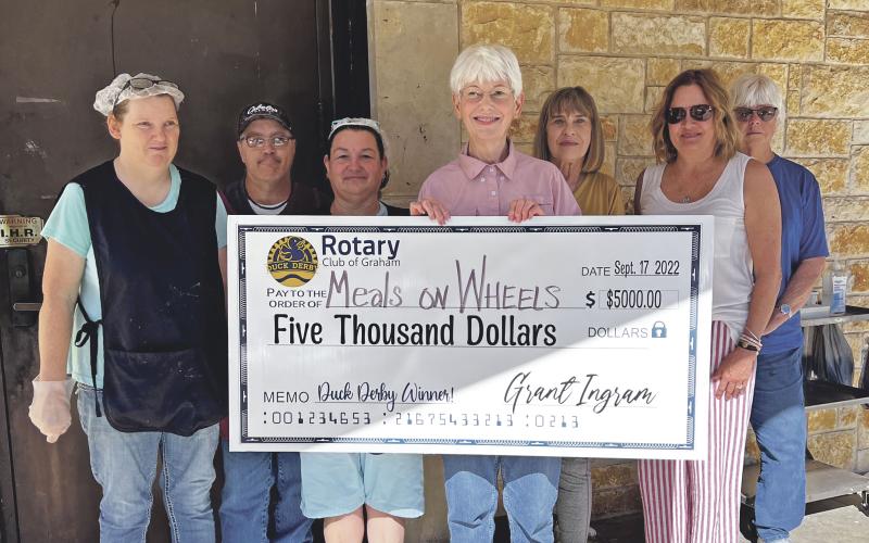 (CONTRIBUTED PHOTO | GRANT INGRAM) Graham Meals On Wheels was presented a check for $5,000 from the winning prize duck at the Rotary Club of Graham Duck Derby Saturday, Sept. 17. Alice Ann Street won the first place prize and donated her winnings to Meals on Wheels