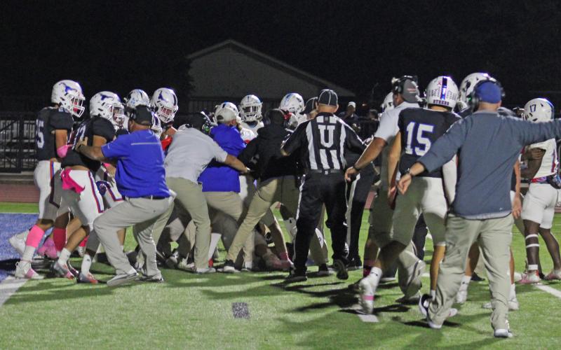 (MIKE WILLIAMS | THE GRAHAM LEADER) A fight broke out late in the third quarter Friday night leading to the suspension of the district opener between the Graham Steers and Hirschi Huskies on Newton Field.