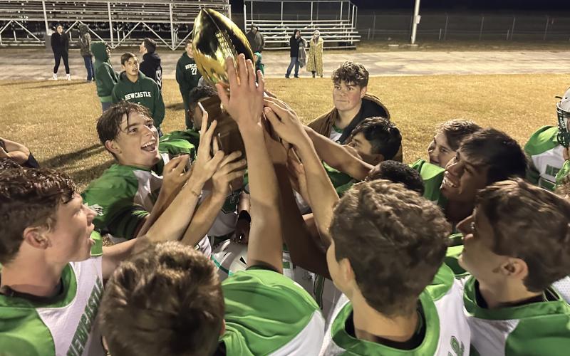 (MIKE WILLIAMS | THE GRAHAM LEADER) The Bobcats celebrate their first district title since 2018 after defeating Forestburg 50-0 on Friday, Nov. 4. The Bobcats will play Rule Thursday, Nov. 10 in Throckmorton for the bi-district championship. Kickoff is at 7:30 p.m.
