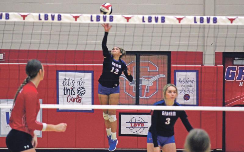 (MIKE WILLIAMS | THE GRAHAM LEADER) Olga Morales finished Friday’s homecoming win over Mineral Wells with eight kills and two aces. The Lady Blues start the district schedule with a 1-0 record following the win. After hosting Brownwood yesterday, the Lady Blues will travel to Glen Rose Friday, Sept. 30 with a scheduled start of 5 p.m.
