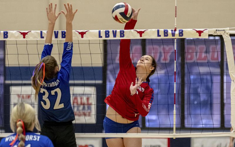 (CONTRIBUTED PHOTO/DAVID FLYNN) Lady Blues junior Peyton Dobbs played an increased role late in Friday’s match, filling in for Tatum Westerman who left with an injury during the fourth set. Lady Blues coach Marci Faulk credited Dobbs for helping create momentum late in the fourth set with three service aces to help the Lady Blues finish the evening with a win.